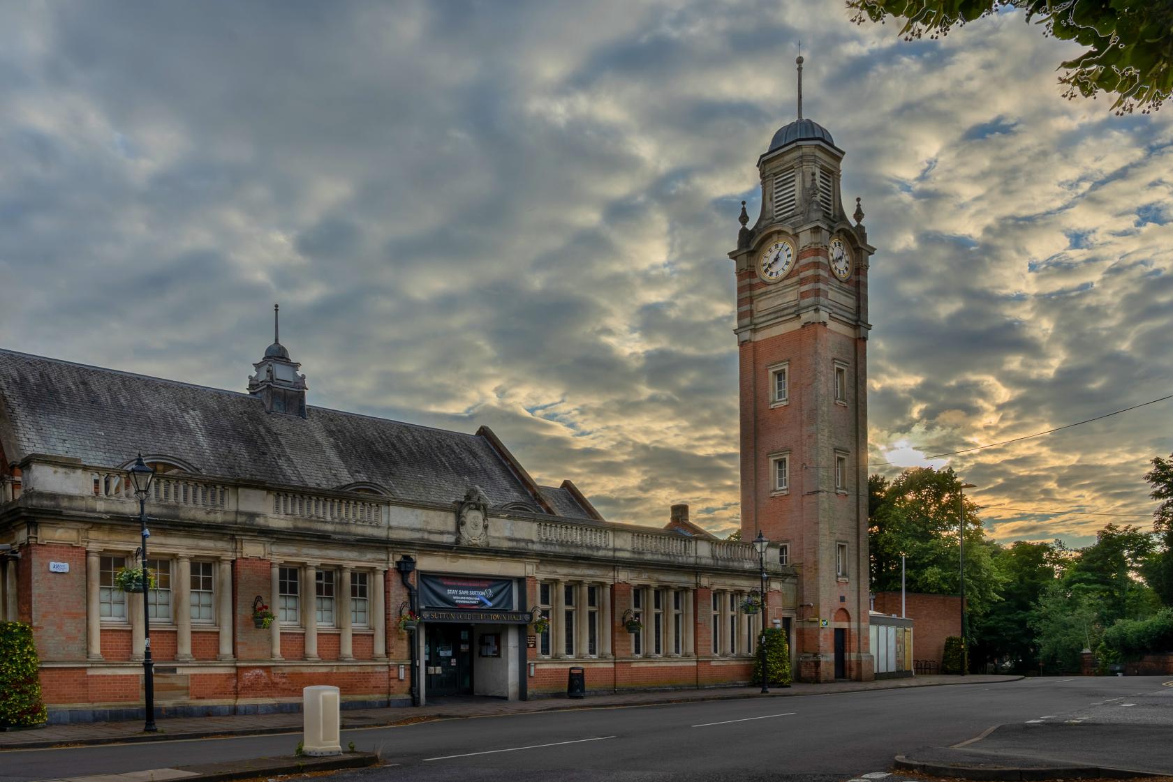 Sutton Coldfield Town Hall with historic clock tower, perfect for events and gatherings. - Banner