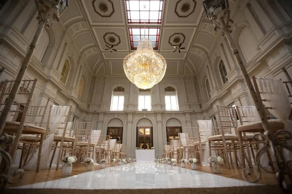 Elegant Grand Station wedding venue with stunning chandelier and inviting decor.