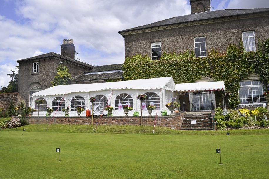 Halesowen Golf Club marquee venue for weddings and corporate events, featuring floral decor. - Banner