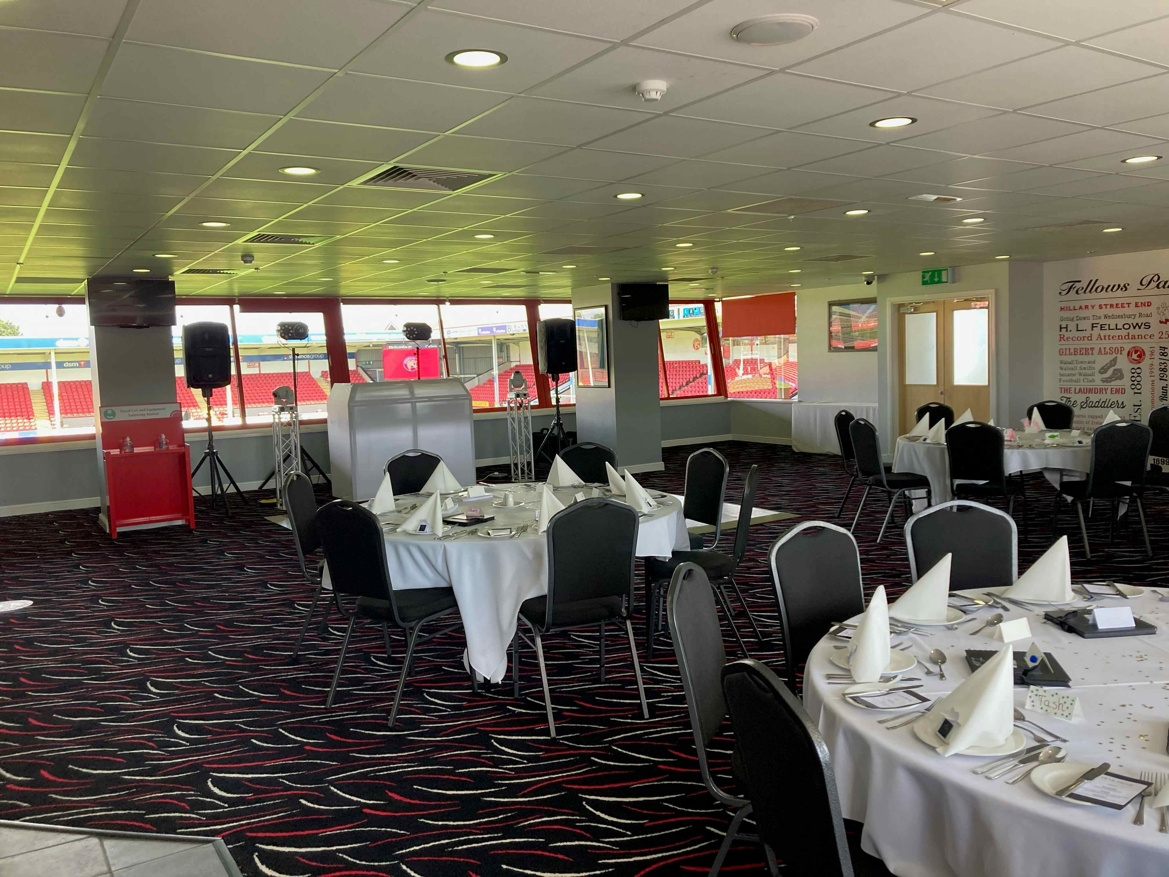 Albert McPherson Lounge event space with round tables, ideal for corporate meetings and celebrations. - Banner