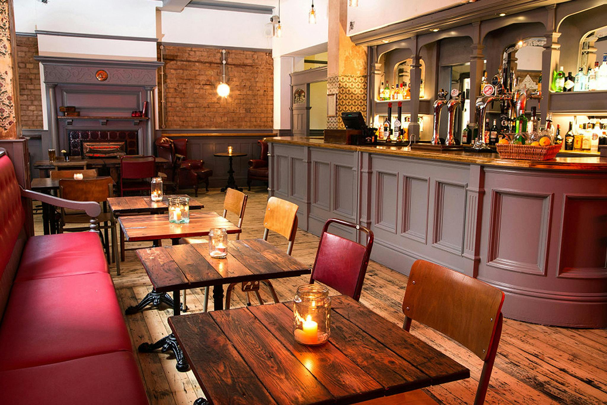 Stylish function room with cozy seating for intimate gatherings in Kings Heath.