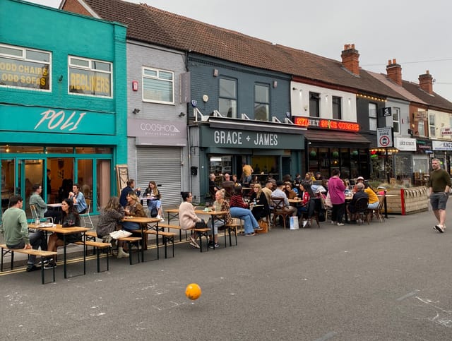 Vibrant outdoor dining at Upstairs Kings Heath, ideal for casual gatherings and events.