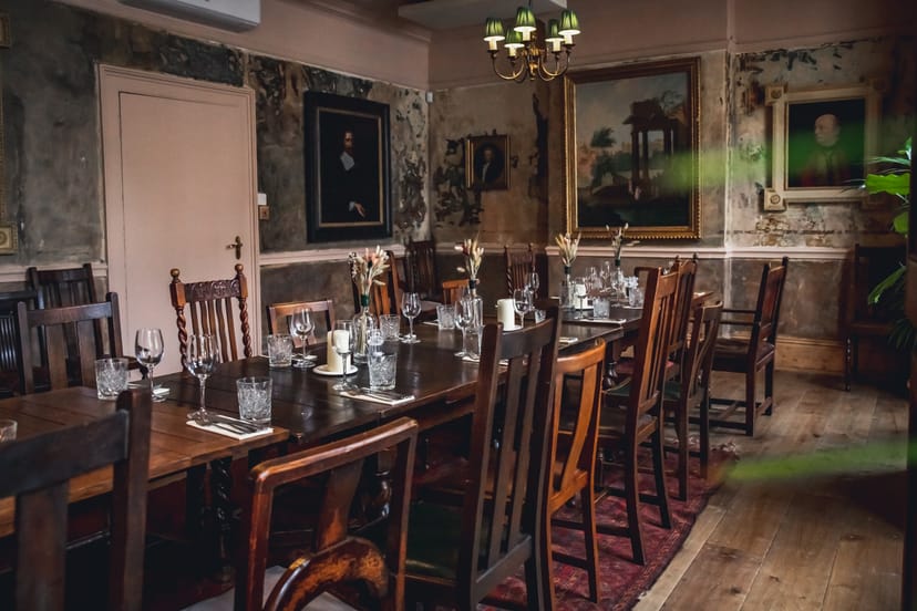 Rustic dining room at The Wilton Arms, ideal for intimate dinners and gatherings.