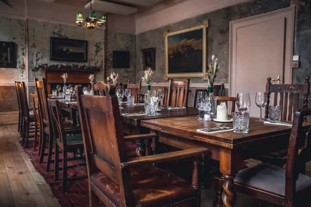 Rustic dining room at The Wilton Arms, ideal for intimate dinners and corporate events.