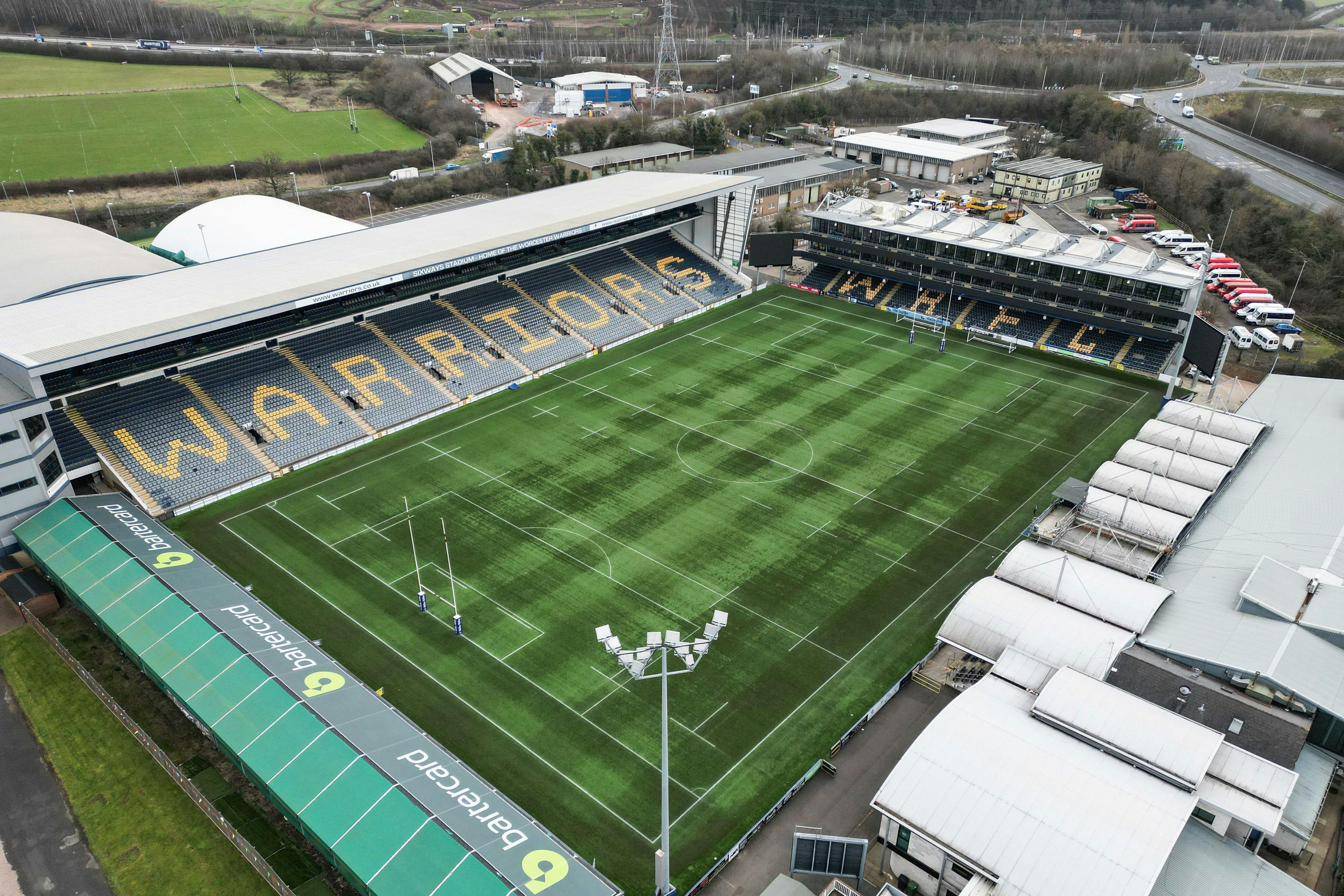 Spacious Sixways Stadium with well-maintained pitch for sports and events.