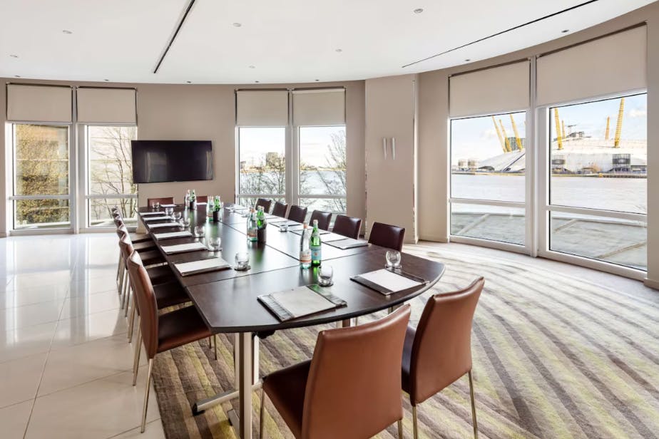 Modern meeting room at Radisson Blu, London with large table for professional gatherings.