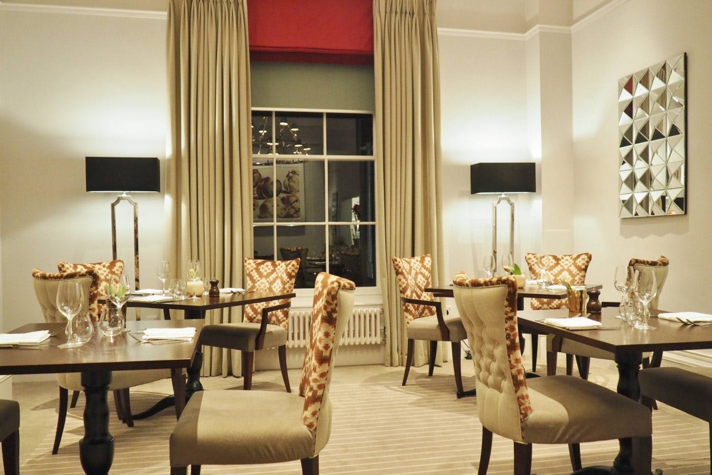 Elegant Bistro dining space with plush seating, ideal for intimate events and networking.