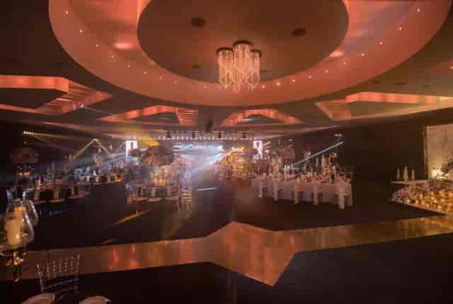 Elegant Grand Ballroom with chandeliers, perfect for weddings and corporate events.