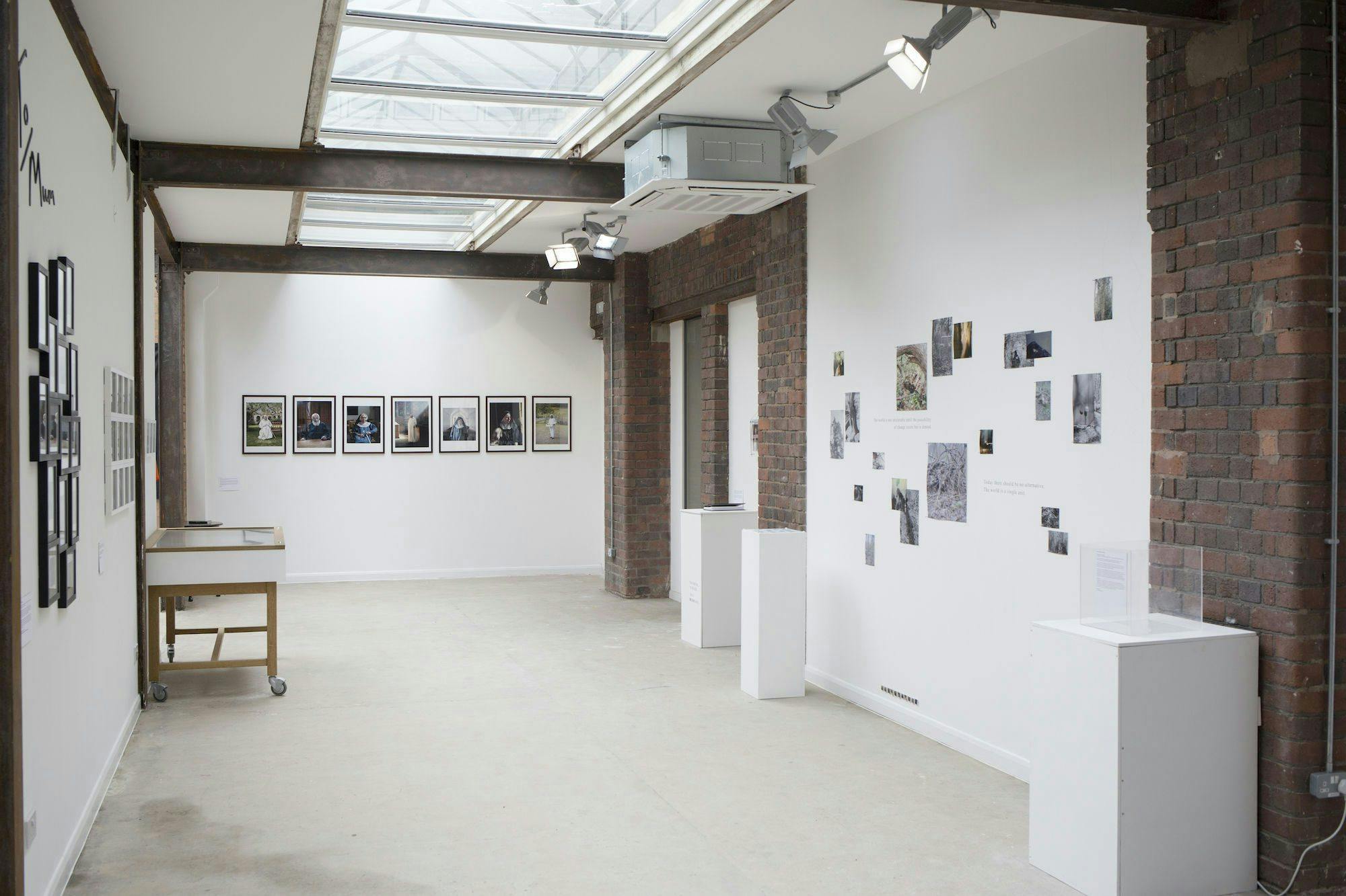 Screening room in Iron House with exposed brick, ideal for events and workshops.