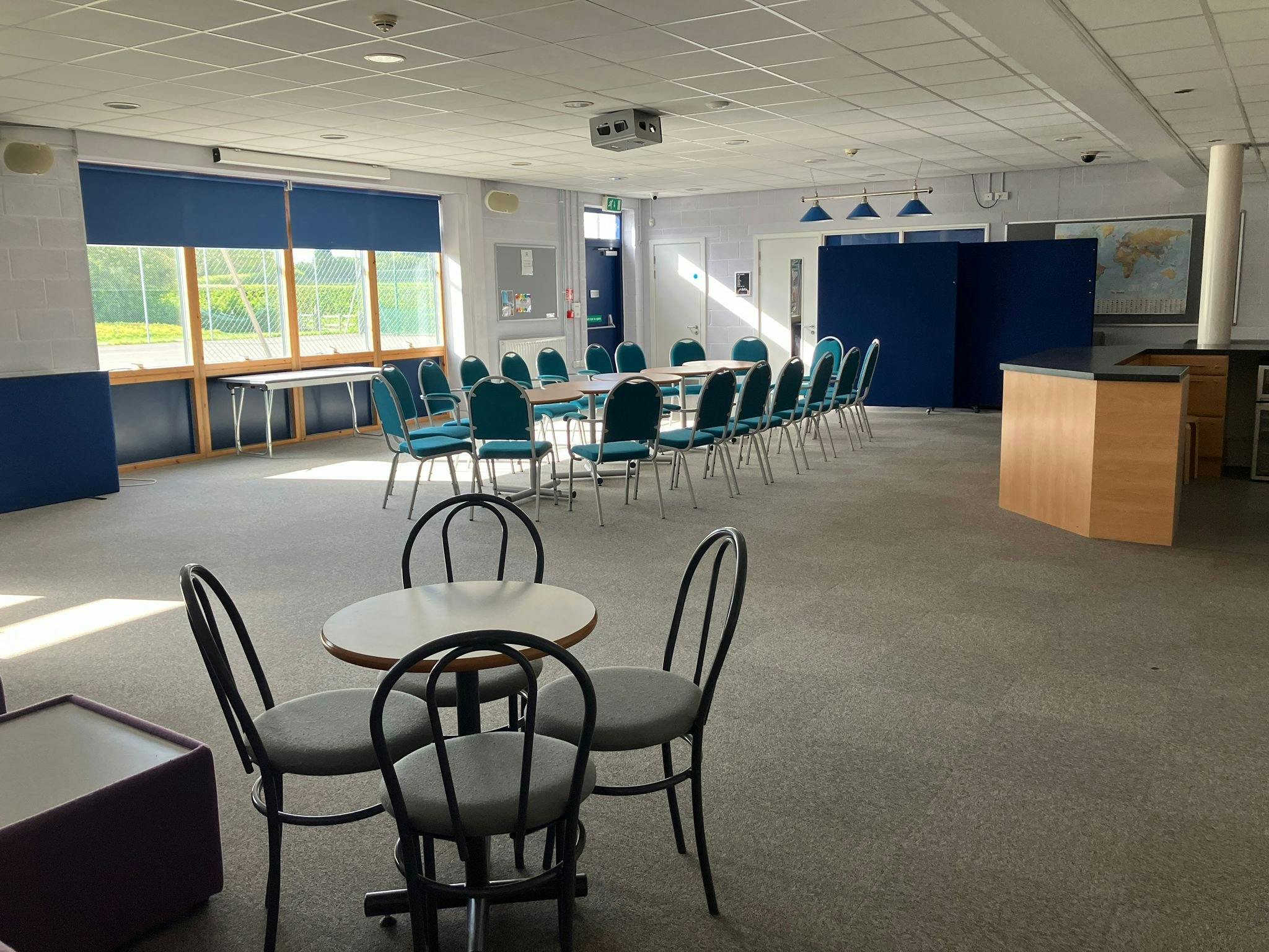 Main Sports Hall with circular seating, ideal for workshops and conferences.