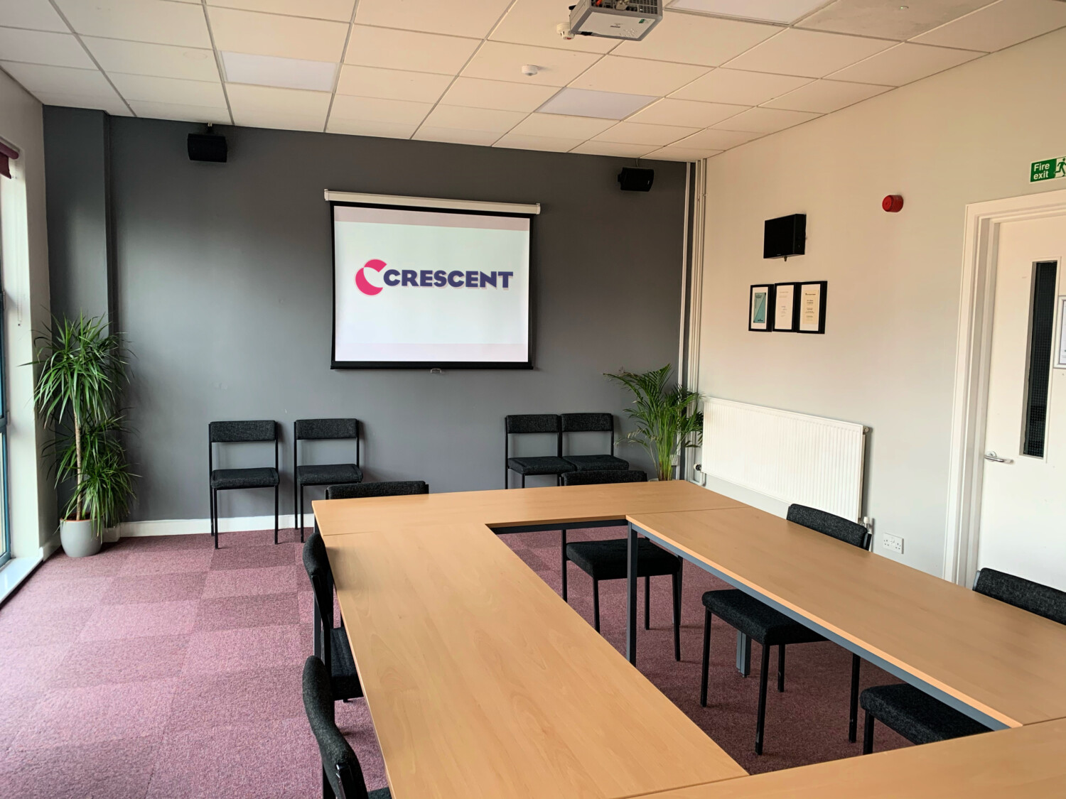 Baskerville Room at Crescent Theatre: bright meeting space with large table, ideal for workshops. - Banner