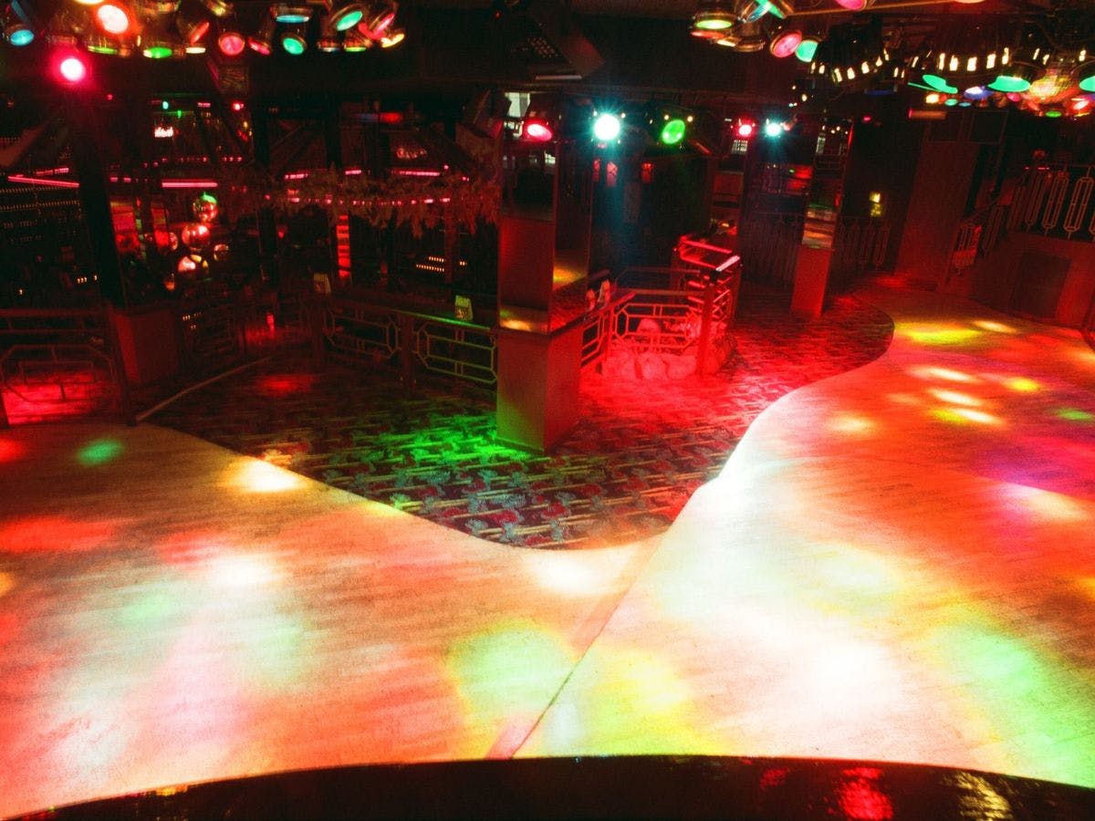 Vibrant nightclub with colorful lighting, ideal for lively events and parties.