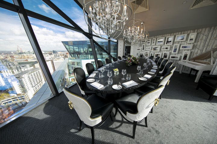 Private dining room with oval table at Marco Pierre White's Steakhouse for meetings.