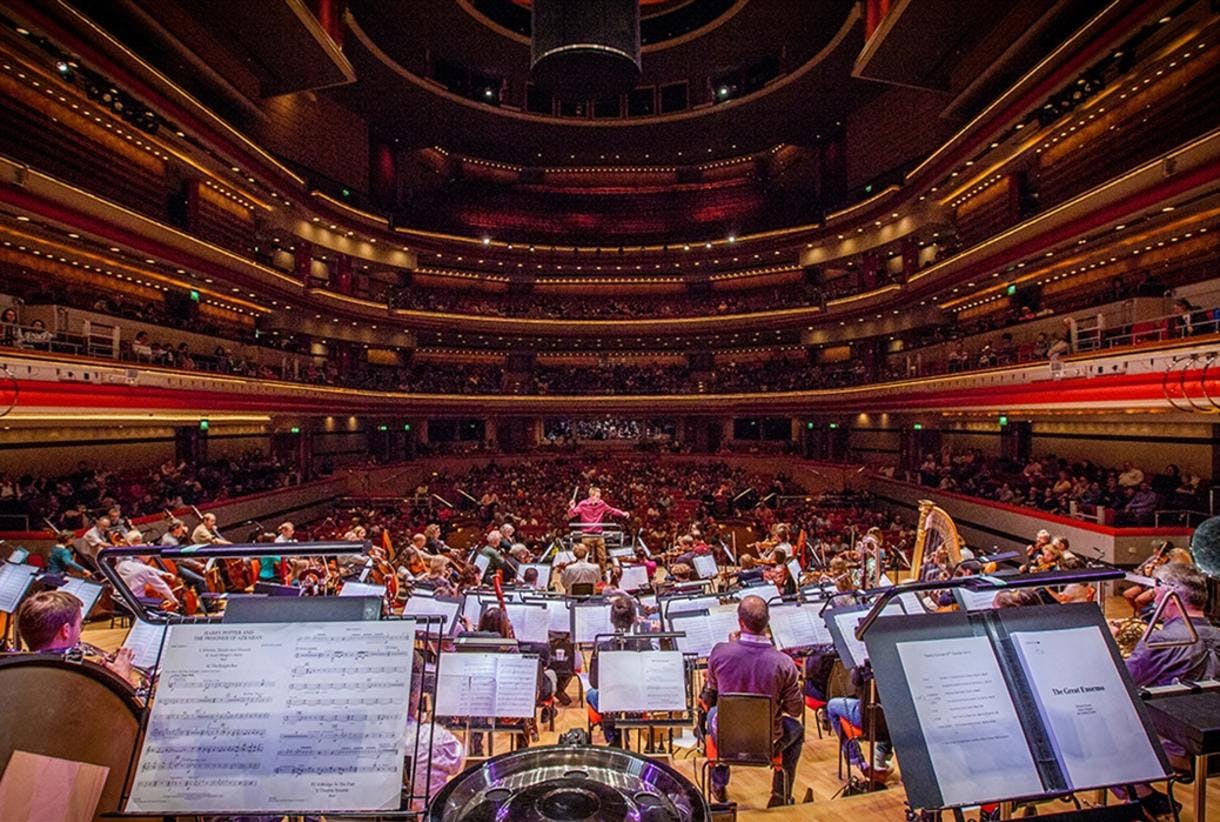 Birmingham Symphony Orchestra concert hall with engaged audience at live performance.