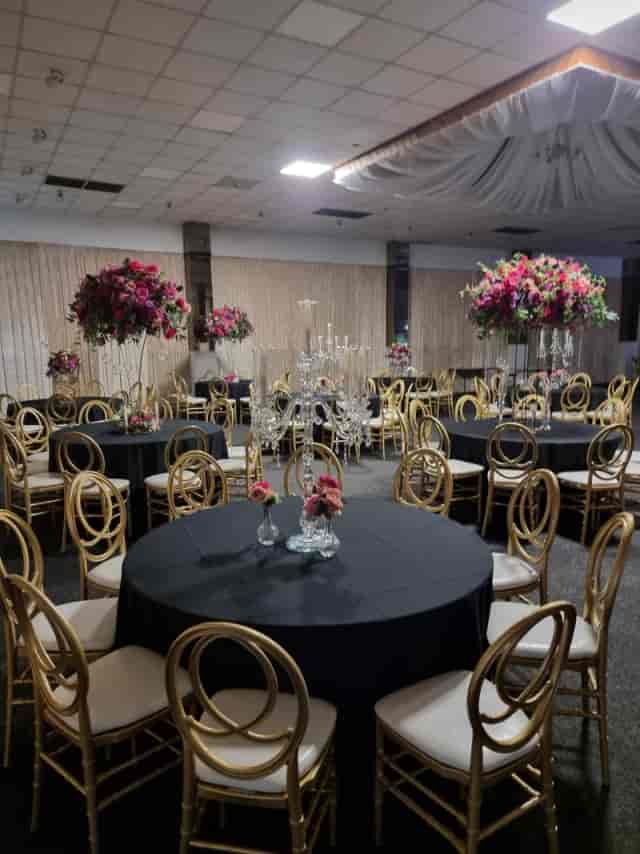 Elegant banquet hall with floral centerpieces for upscale events and celebrations.