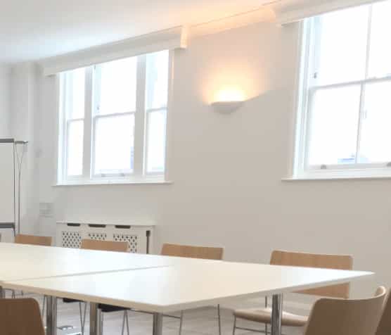 Minimalist meeting room in St Pauls Knightsbridge, perfect for collaborative sessions.