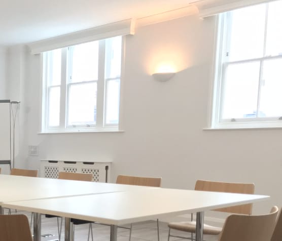 Minimalist meeting room in St Pauls Knightsbridge, perfect for collaborative sessions.