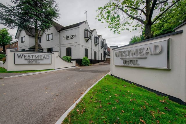Westmead Hotel entrance with modern facade, ideal for corporate events and meetings.
