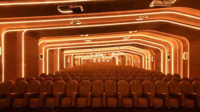 Modern auditorium at Le Grand Rex with plush seating, ideal for immersive events.