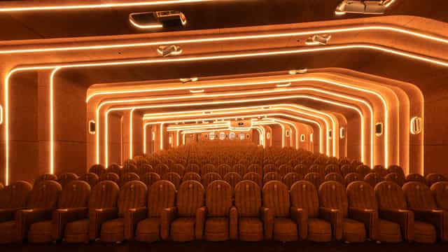 Modern auditorium at Le Grand Rex with plush seating, ideal for immersive events.