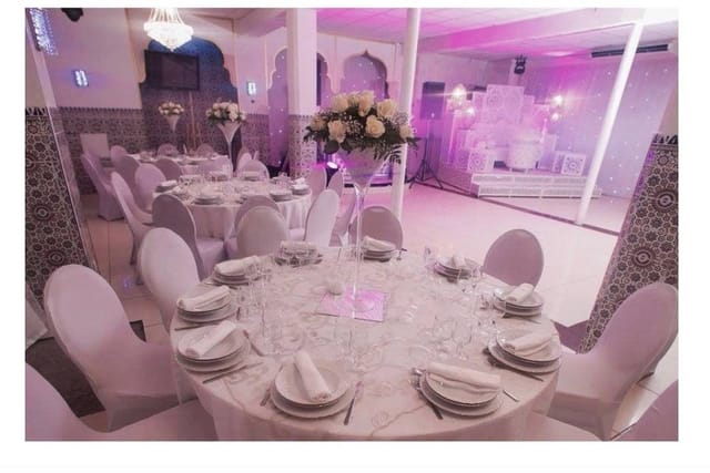Elegant banquet space with floral centerpieces, perfect for weddings and corporate events.