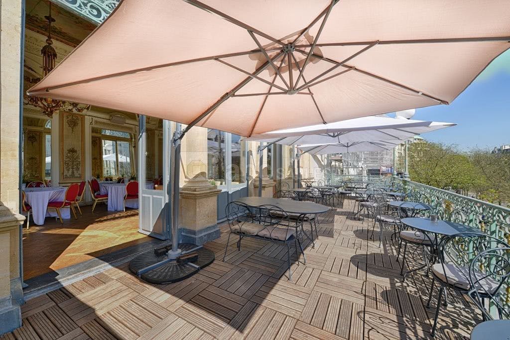 Stylish outdoor terrace at Théâtre du Gymnase, ideal for events and gatherings.