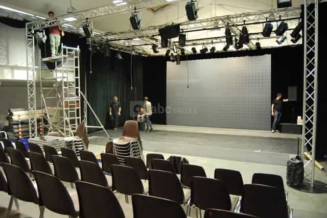 Stage setup at Salle de spectacles, Maison des Métallos for an upcoming event.