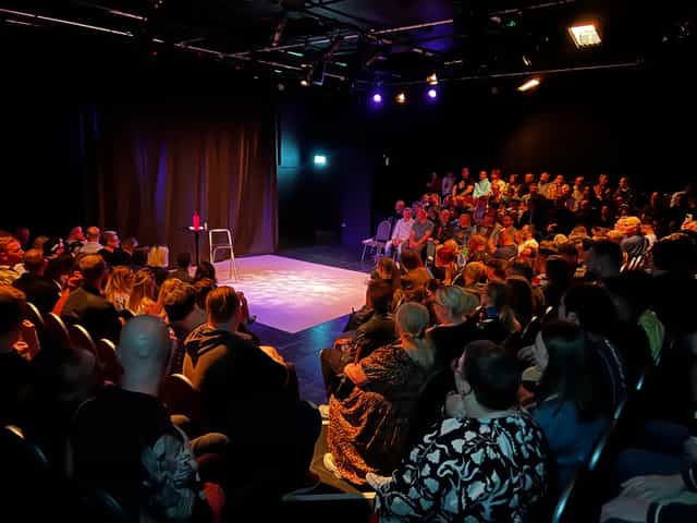 Packed auditorium at King's Head Theatre, intimate setting for engaging performances.