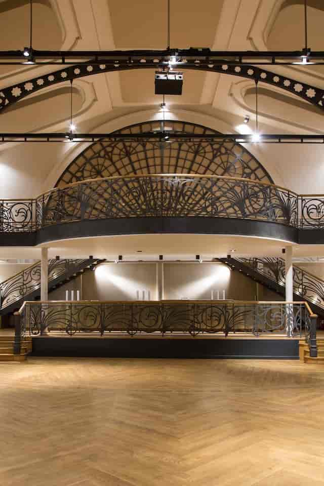 Elegant L'Élysée Montmartre venue with intricate balcony, perfect for upscale events.