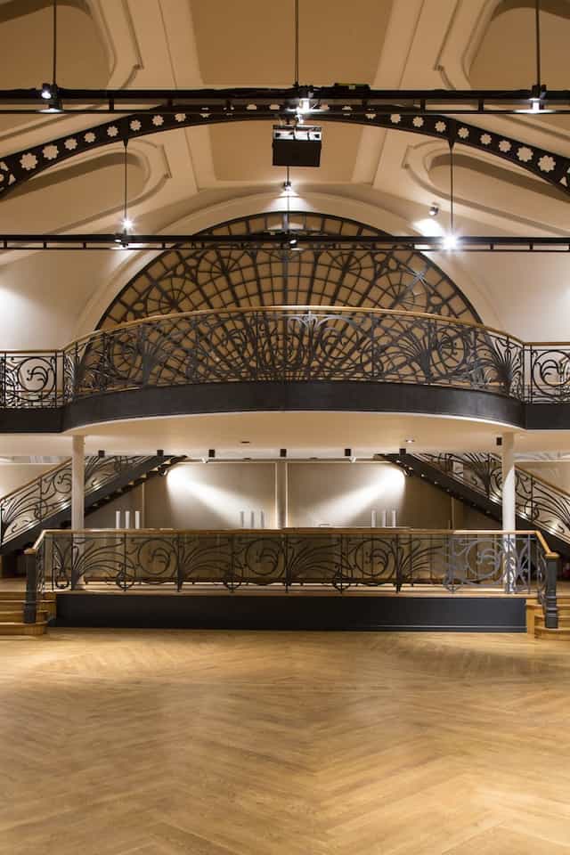 Elegant L'Élysée Montmartre venue with intricate balcony, perfect for upscale events.