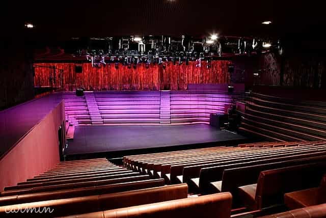 Théâtre Claude Lévi-Strauss foyer with tiered seating for corporate events and performances.