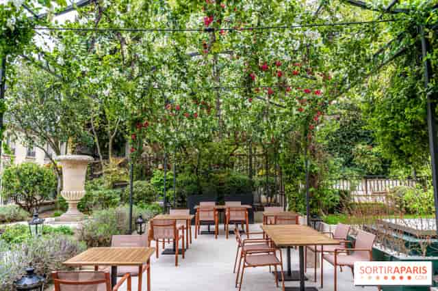 Outdoor terrace at Derrière, lush greenery, ideal for events and receptions.