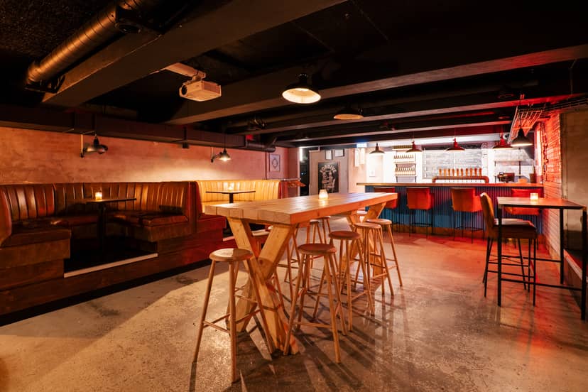 Versatile event space with cozy seating for networking and social gatherings in SKAAL.