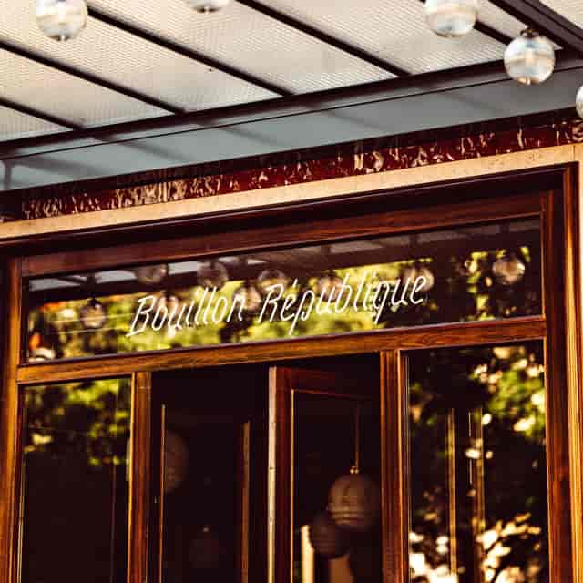 Elegant entrance of DÉJAZET, Bouillon République for upscale events and gatherings.