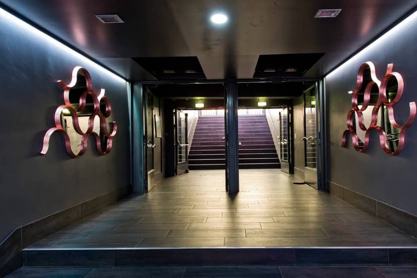 Modern event space entrance in Carré Montparnasse, perfect for upscale meetings and events.