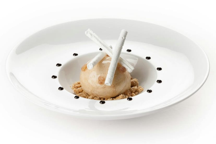 Elegant dessert with creamy center at Ciel de Paris for upscale dining events.