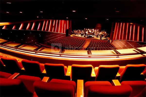 Modern auditorium with tiered seating in Palais des Congrès, perfect for conferences and events.
