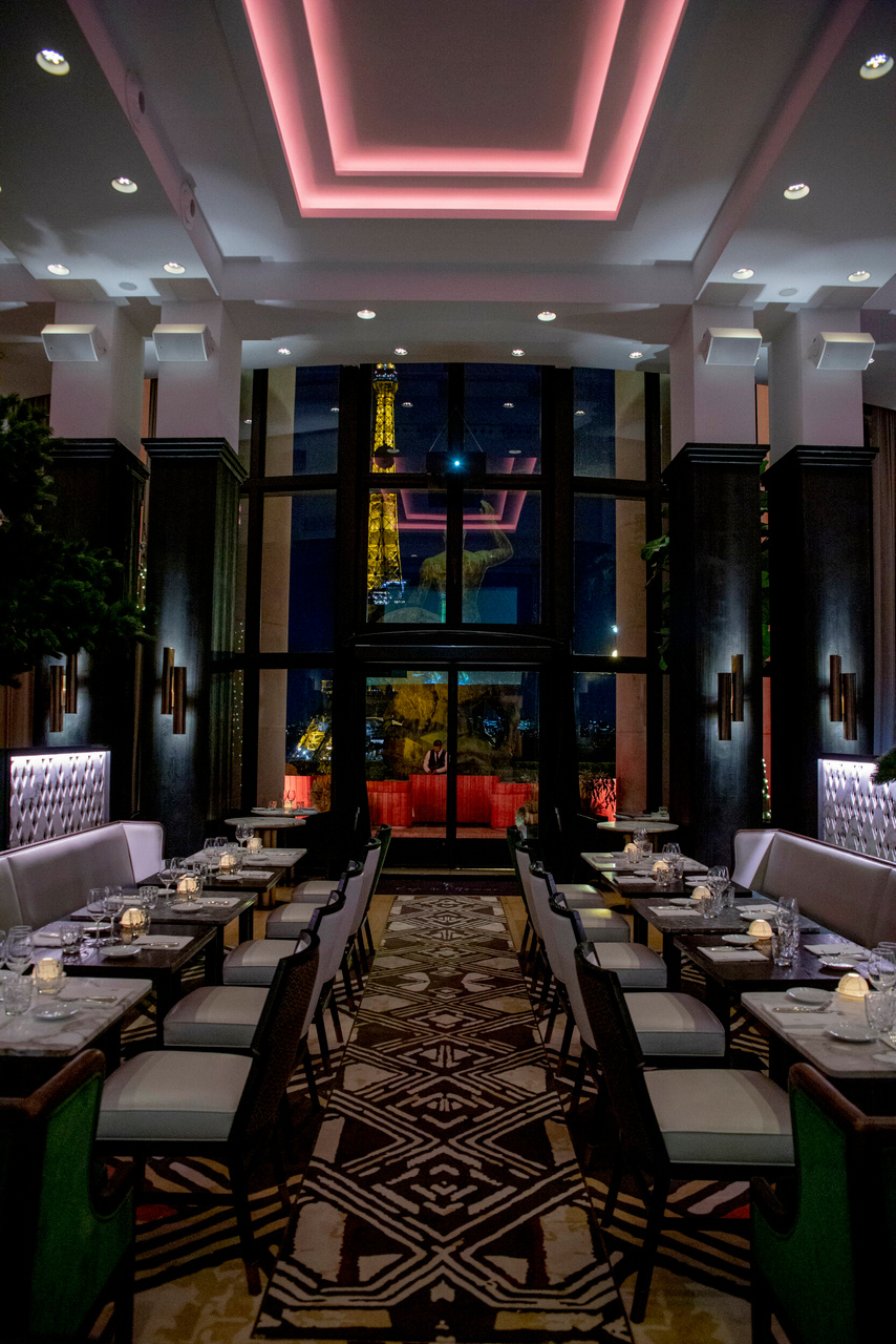 Elegant dining space at Café de l'Homme with Eiffel Tower view for upscale events.