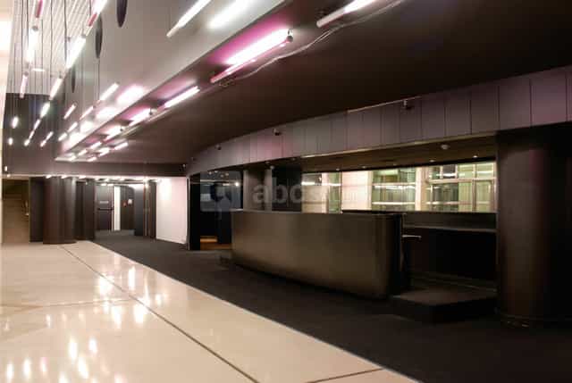 Le Grand Foyer, modern event space with polished floors, ideal for corporate gatherings.