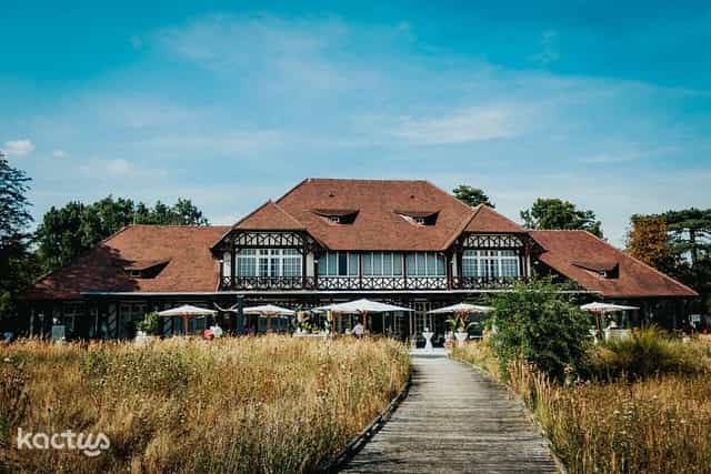 Charming rustic venue with patio for outdoor weddings and corporate retreats.
