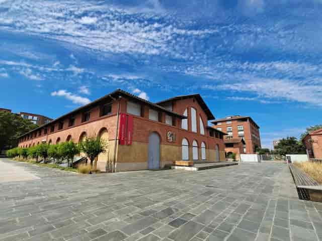 Art museum Les Abattoirs, charming brick exterior, ideal for corporate and social events.
