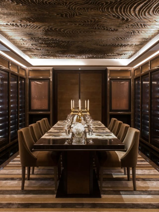 Elegant private dining room at Hôtel du Collectionneur for corporate events and exclusive dinners.