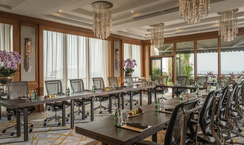 Sophisticated meeting room at Four Seasons Singapore with elegant decor for corporate events.