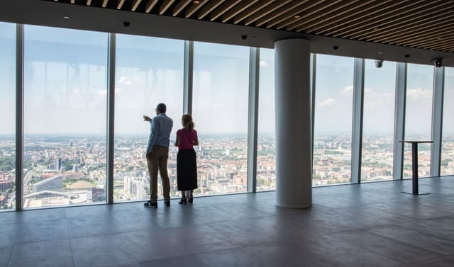Modern event space in Tower 47 Milano with panoramic city views for corporate gatherings.