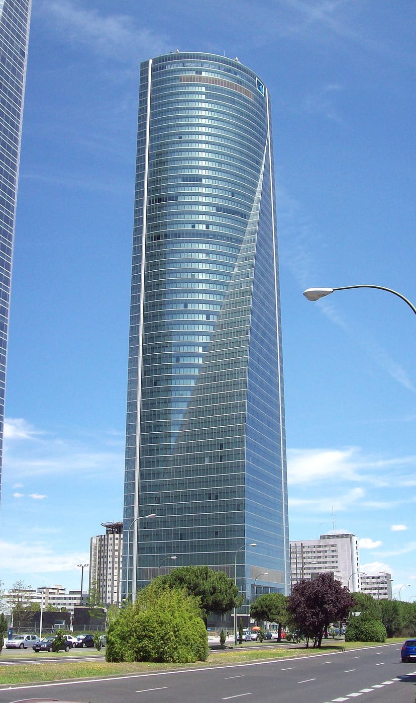 Modern Torre Emperador Castellana skyscraper with glass facade for corporate events.