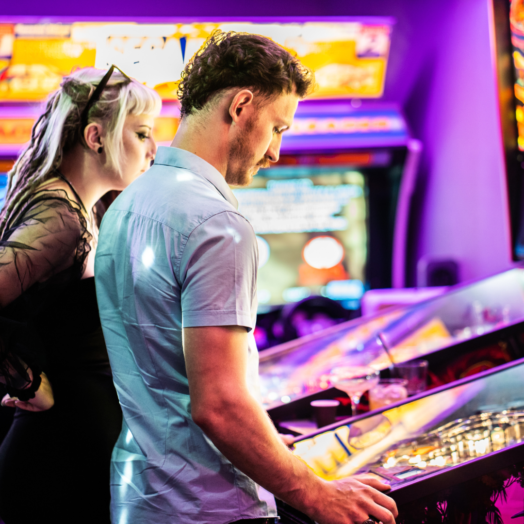 Vibrant Four Quarters Newcastle venue with colorful arcade, ideal for social events and team-building. - Banner