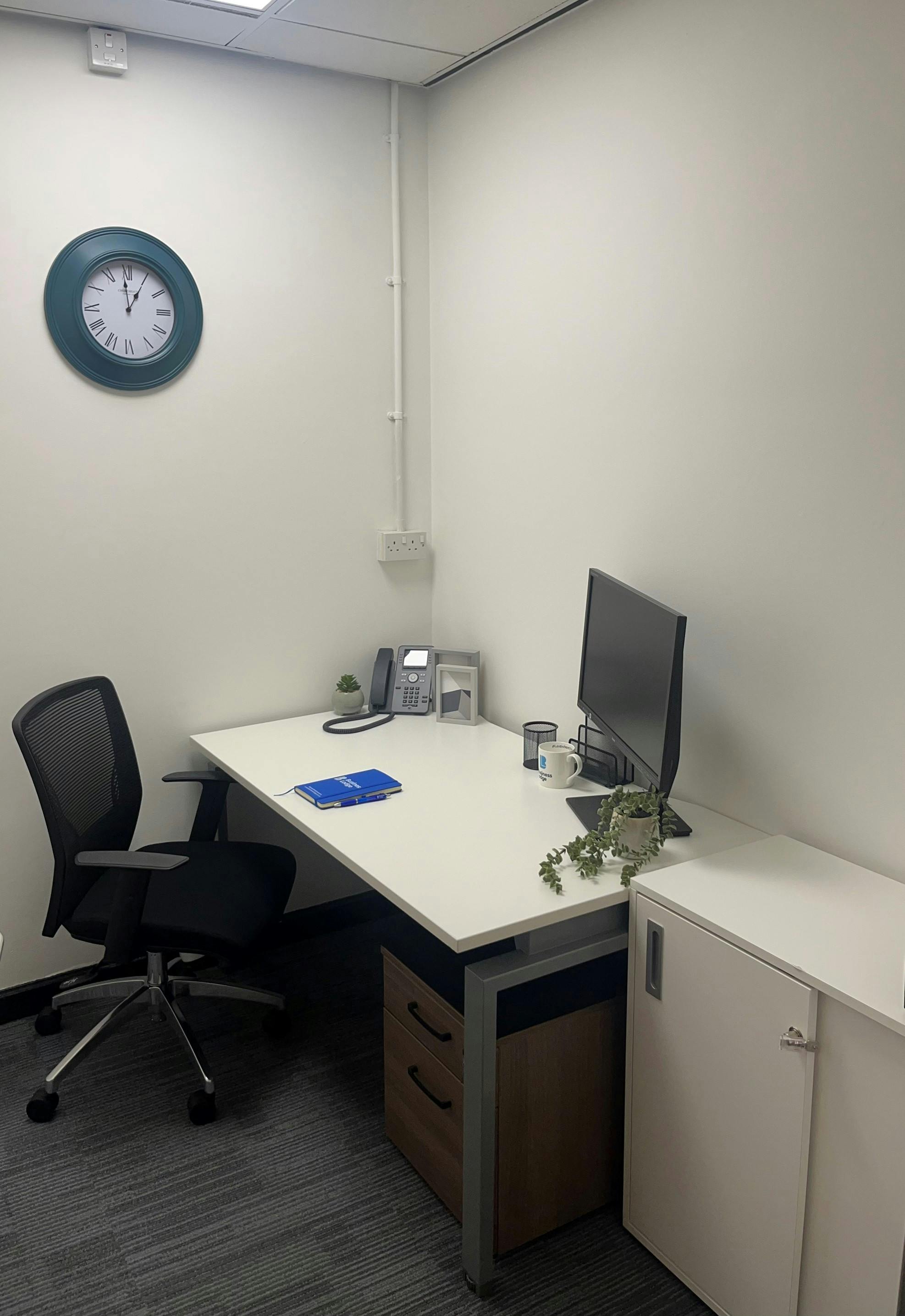 Dedicated desks in Bury Businesslodge for professional meetings and brainstorming sessions.