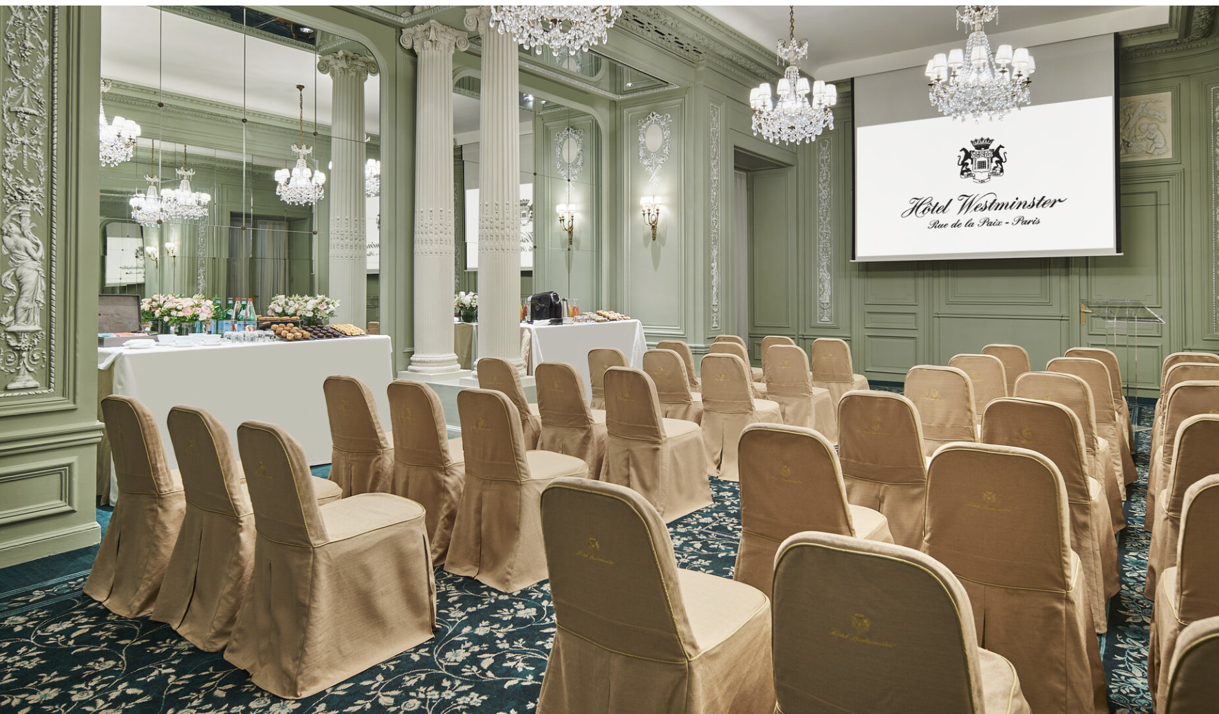 Elegant meeting space at Hotel Westminster Paris with plush seating for corporate events.