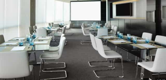 Modern meeting suite in Jumeirah Emirates Towers, perfect for corporate workshops.
