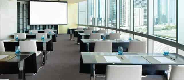 Modern conference room at Jumeirah Emirates Towers, ideal for corporate meetings and events.